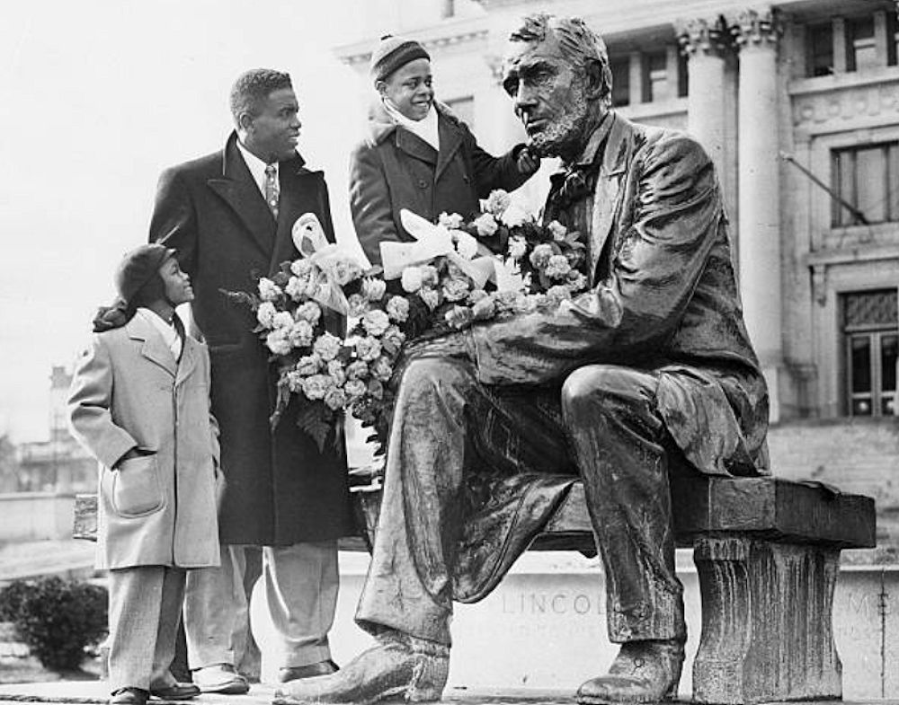 Jackie Robinson
Jackie Robinson shows his son and the son of Roy Campanella the statue of Abraham Lincoln that stands outside the Essex County Courthouse in Newark, New Jersey in February of 1951.

Photo by Mark Rucker/Transcendental Graphics
