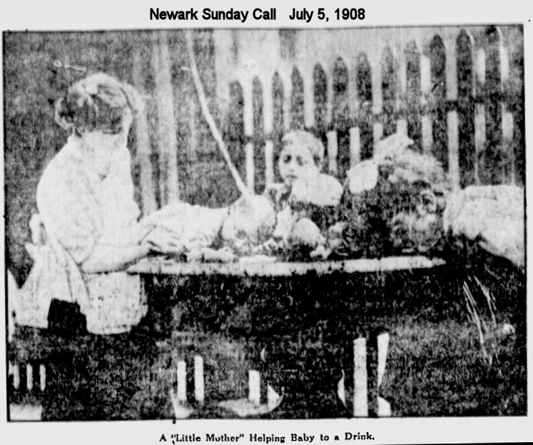 A "Little Mother" Helping Baby to a Drink
1908
